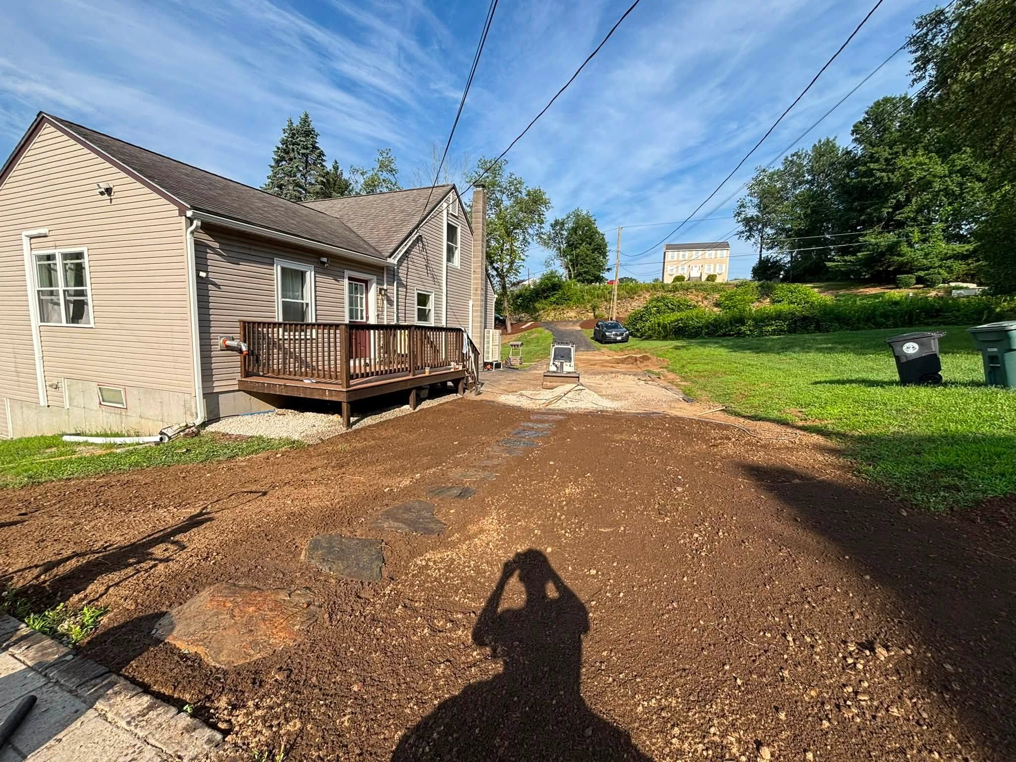 Finished project — drainage corrected and natural stone walkway set